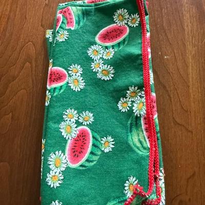 4 watermelon napkins and 6 plaid napkins