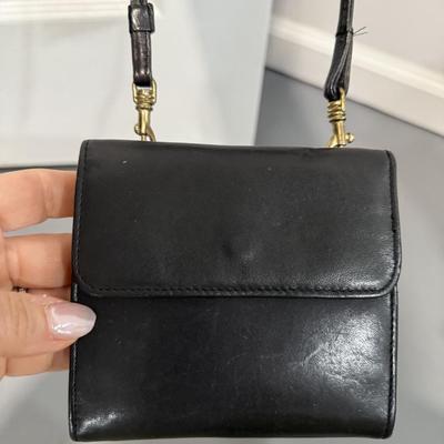 Two small leather satchels, one is Wilson leather