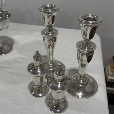 Sterling silver candlesticks and salt and pepper shakers