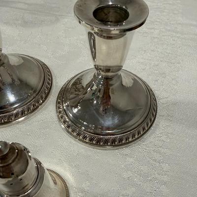 Sterling silver candlesticks and salt and pepper shakers