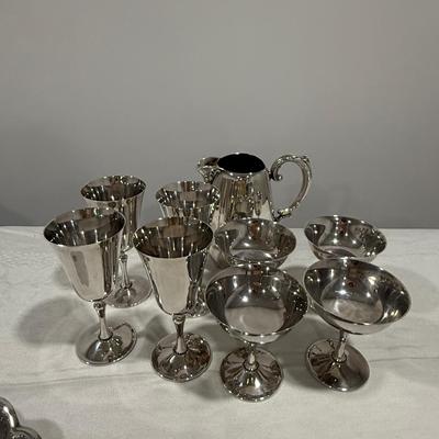 Lot of silver pitcher with goblets
