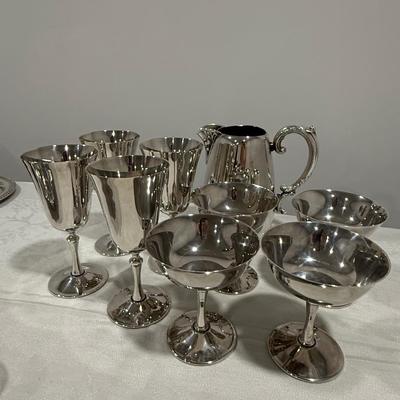 Lot of silver pitcher with goblets
