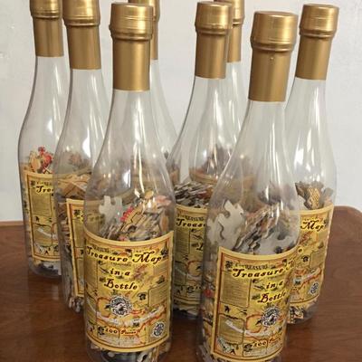 Lot/8 treasure map puzzles in a bottle. 