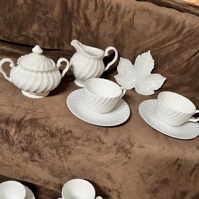 Lot 114 White - made in England cream and sugar set with two sizes of tea cups
