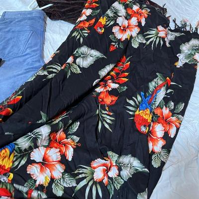 Lot 158 8 pairs of leather and suede pants and a floral wrap skirt