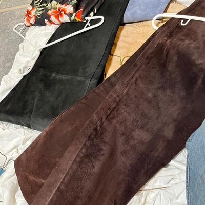 Lot 158 8 pairs of leather and suede pants and a floral wrap skirt