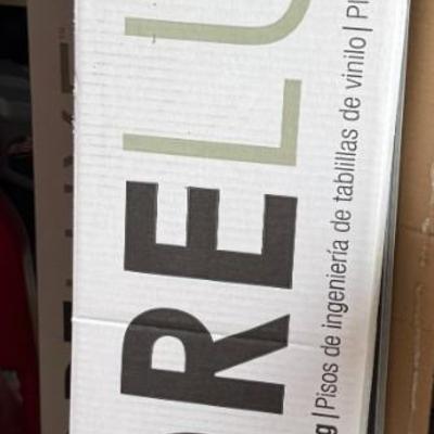 Five Boxes of CoreLuxe Vinyl Plank Flooring