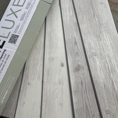 Five Boxes of CoreLuxe Vinyl Plank Flooring