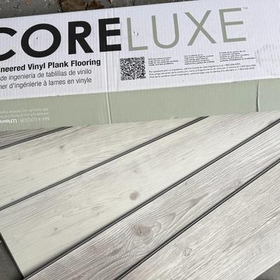Five Boxes of CoreLuxe Vinyl Plank Flooring