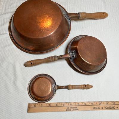 Lot 383 Antique copper skillets