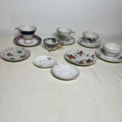 Lot 412 Decorative Cups & Saucers