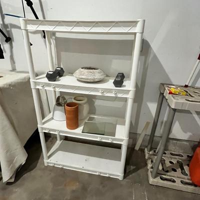 Lot 467 Plastic shelf & contents