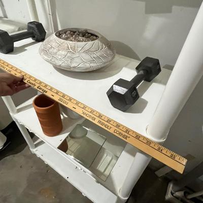 Lot 467 Plastic shelf & contents