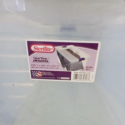 Four Storage Totes with Lids