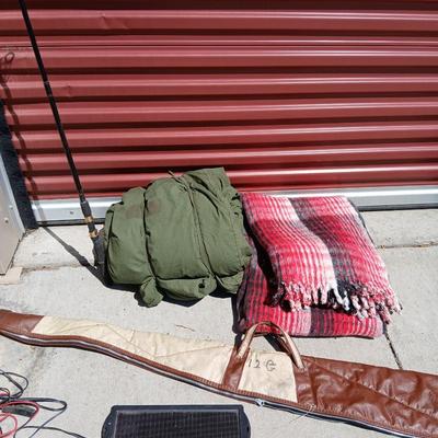 Outdoor Gear Lot – Sleeping Bag, Wool Blanket, fishing Rod, Solar Panel & Gun Case