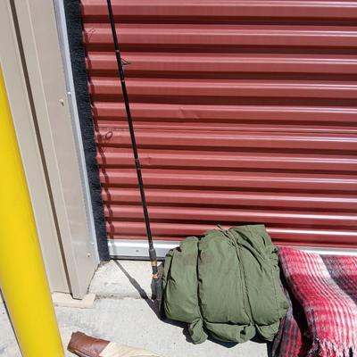 Outdoor Gear Lot – Sleeping Bag, Wool Blanket, fishing Rod, Solar Panel & Gun Case