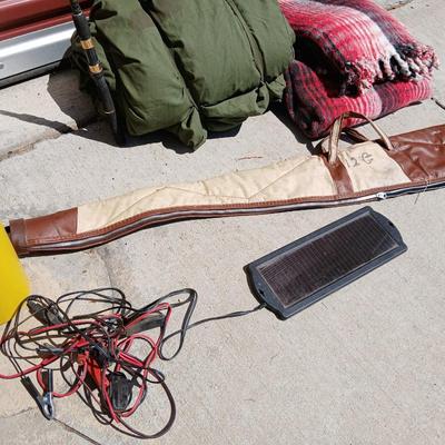Outdoor Gear Lot – Sleeping Bag, Wool Blanket, fishing Rod, Solar Panel & Gun Case