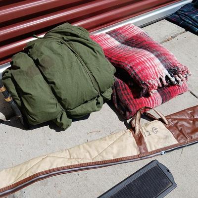 Outdoor Gear Lot – Sleeping Bag, Wool Blanket, fishing Rod, Solar Panel & Gun Case