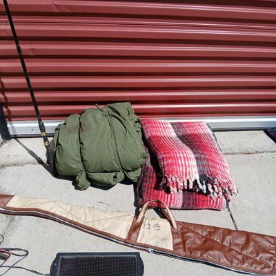 Outdoor Gear Lot – Sleeping Bag, Wool Blanket, fishing Rod, Solar Panel & Gun Case