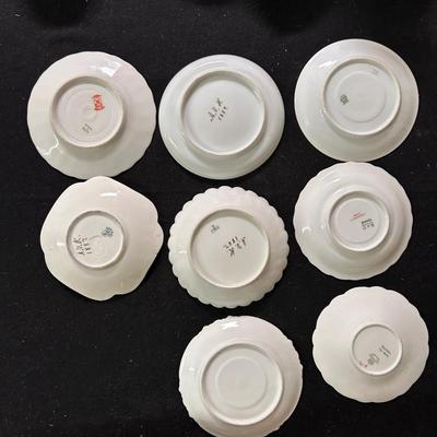 Lot of 8 unmatched saucers