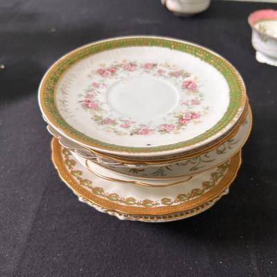 Lot of 8 unmatched saucers