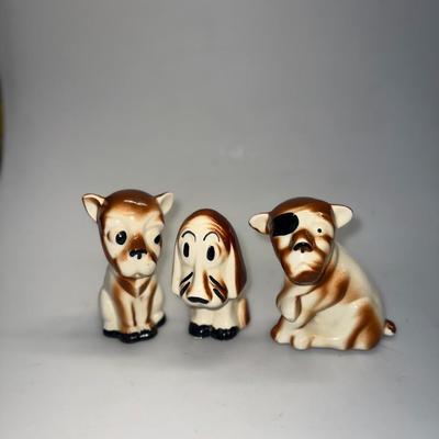 Three Ceramic Dogs including the Rio Hondo Bassett 