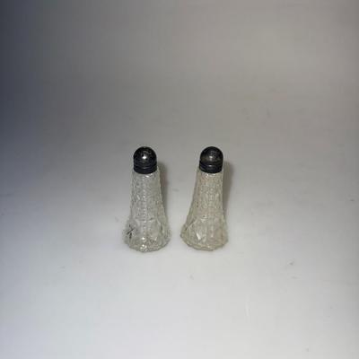 Antique set of clear crystal salt & pepper shakers. Sterling silver caps. Vintage