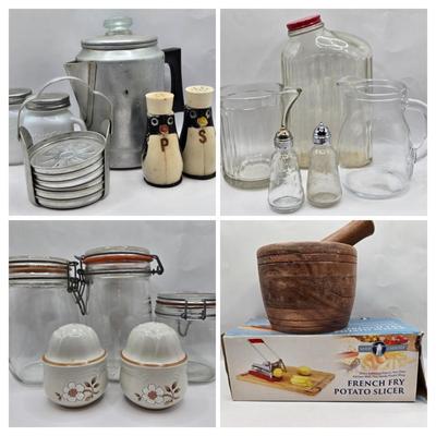 LOT 37: Kitchen Cabinet Lot Including Salt and Pepper Shakers, Vintage Coffee Pot, Coasters, Mortar and Pestle, and More