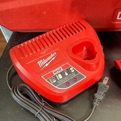 LOT 58: Milwaukee Tools and Accessories - Fuel Hex Hydraulic Driver, Charger with Storage Case and More