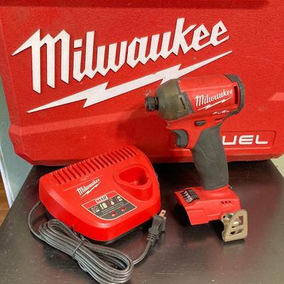 LOT 58: Milwaukee Tools and Accessories - Fuel Hex Hydraulic Driver, Charger with Storage Case and More
