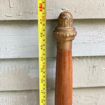 LOT 75: Large Barbarian Wood / Brass Handle Sword with Black Sheath