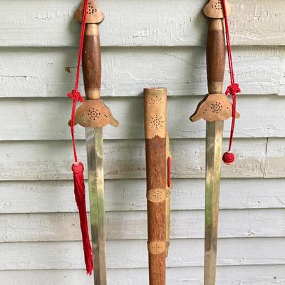 LOT 76: Ceremonial Single Edge Swords with Wood Scabbard