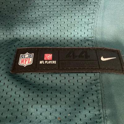 LOT 77: Nick Foles Eagles NFL Super Bowl Jersey Size 44, Football Cards, The Great Book of Philadelphia Sports Lists, Donovan McNabb...