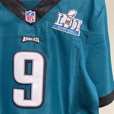 LOT 77: Nick Foles Eagles NFL Super Bowl Jersey Size 44, Football Cards, The Great Book of Philadelphia Sports Lists, Donovan McNabb...