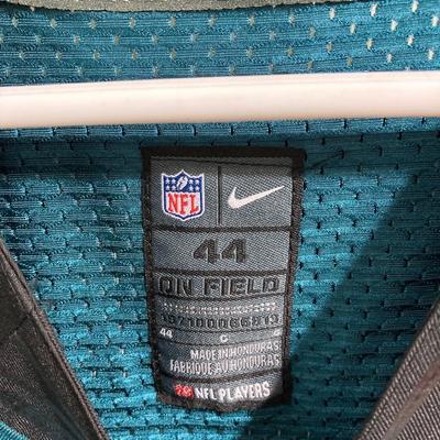 LOT 77: Nick Foles Eagles NFL Super Bowl Jersey Size 44, Football Cards, The Great Book of Philadelphia Sports Lists, Donovan McNabb...