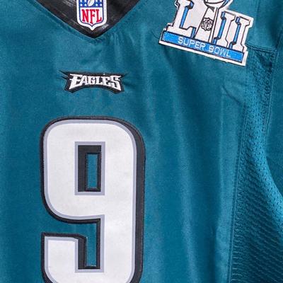 LOT 77: Nick Foles Eagles NFL Super Bowl Jersey Size 44, Football Cards, The Great Book of Philadelphia Sports Lists, Donovan McNabb...