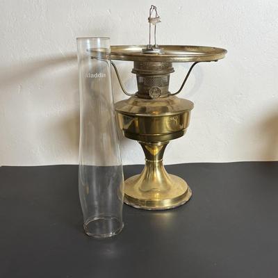 LOT 84: Porcelain Art Nouveau Style Figural Vase, Brass Candle Sticks & Aladdin Oil Brass Oil Lamp (missing shade)