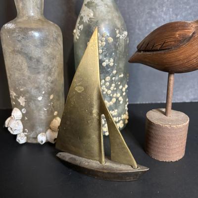 LOT 85: Seaside Collection: Ceramic Lighthouse Lamp, Wooden Carved Pelican, Sea Glass Bottles w/Barnacles, Lighthouse Painting on Slate,...