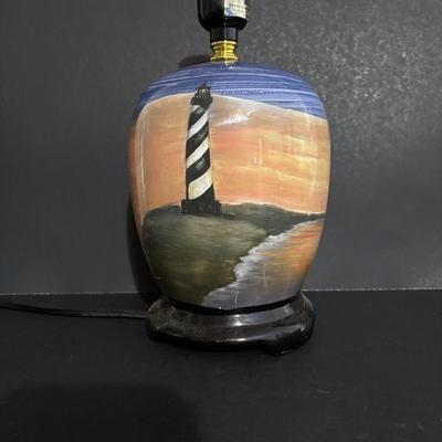 LOT 85: Seaside Collection: Ceramic Lighthouse Lamp, Wooden Carved Pelican, Sea Glass Bottles w/Barnacles, Lighthouse Painting on Slate,...