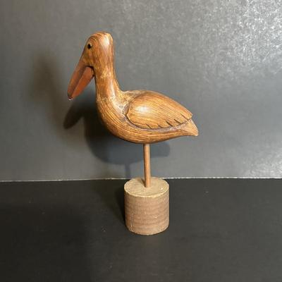 LOT 85: Seaside Collection: Ceramic Lighthouse Lamp, Wooden Carved Pelican, Sea Glass Bottles w/Barnacles, Lighthouse Painting on Slate,...