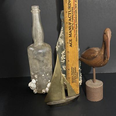 LOT 85: Seaside Collection: Ceramic Lighthouse Lamp, Wooden Carved Pelican, Sea Glass Bottles w/Barnacles, Lighthouse Painting on Slate,...