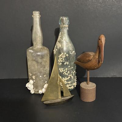 LOT 85: Seaside Collection: Ceramic Lighthouse Lamp, Wooden Carved Pelican, Sea Glass Bottles w/Barnacles, Lighthouse Painting on Slate,...