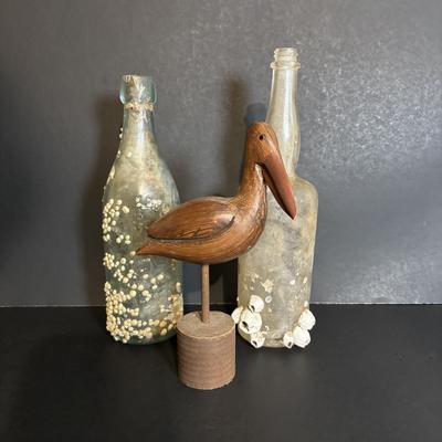 LOT 85: Seaside Collection: Ceramic Lighthouse Lamp, Wooden Carved Pelican, Sea Glass Bottles w/Barnacles, Lighthouse Painting on Slate,...