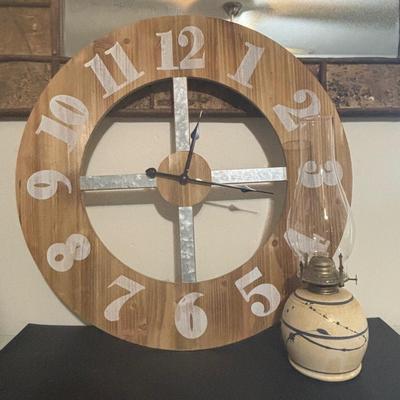 LOT 96 Home Decor: Rustic Bark Framed Mirror, 24" Wooden & Galvanized Wall Clock & Pottery Oil Lamp