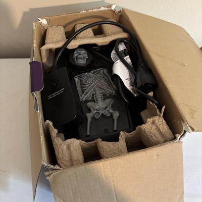LOT 107: Untested 400-watt Fog Machine, Skeltons, Skull & Crossbones T-shirt (Haven Harbour Marina Resort)