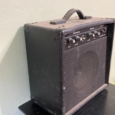 LOT 119: Rock On Collection - AC / DC & Ozzy Osbourne Memorabilia, Rock Band Metal Double Sided Axe, Austin Amplifier and More