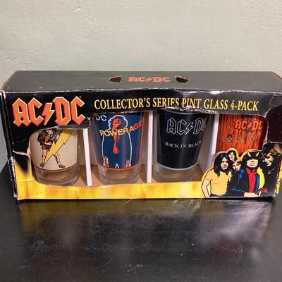 LOT 119: Rock On Collection - AC / DC & Ozzy Osbourne Memorabilia, Rock Band Metal Double Sided Axe, Austin Amplifier and More