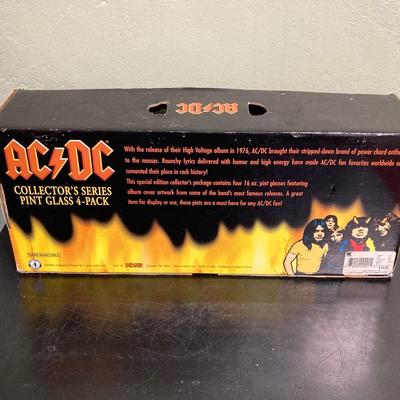 LOT 119: Rock On Collection - AC / DC & Ozzy Osbourne Memorabilia, Rock Band Metal Double Sided Axe, Austin Amplifier and More