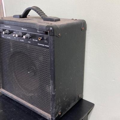 LOT 119: Rock On Collection - AC / DC & Ozzy Osbourne Memorabilia, Rock Band Metal Double Sided Axe, Austin Amplifier and More