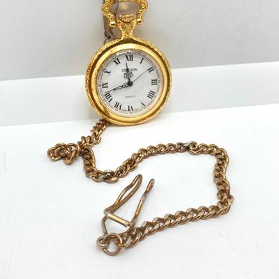 LOT 123: Pair of Gold Tone Pocket Watches with Chains (Unitron and Xanadu)